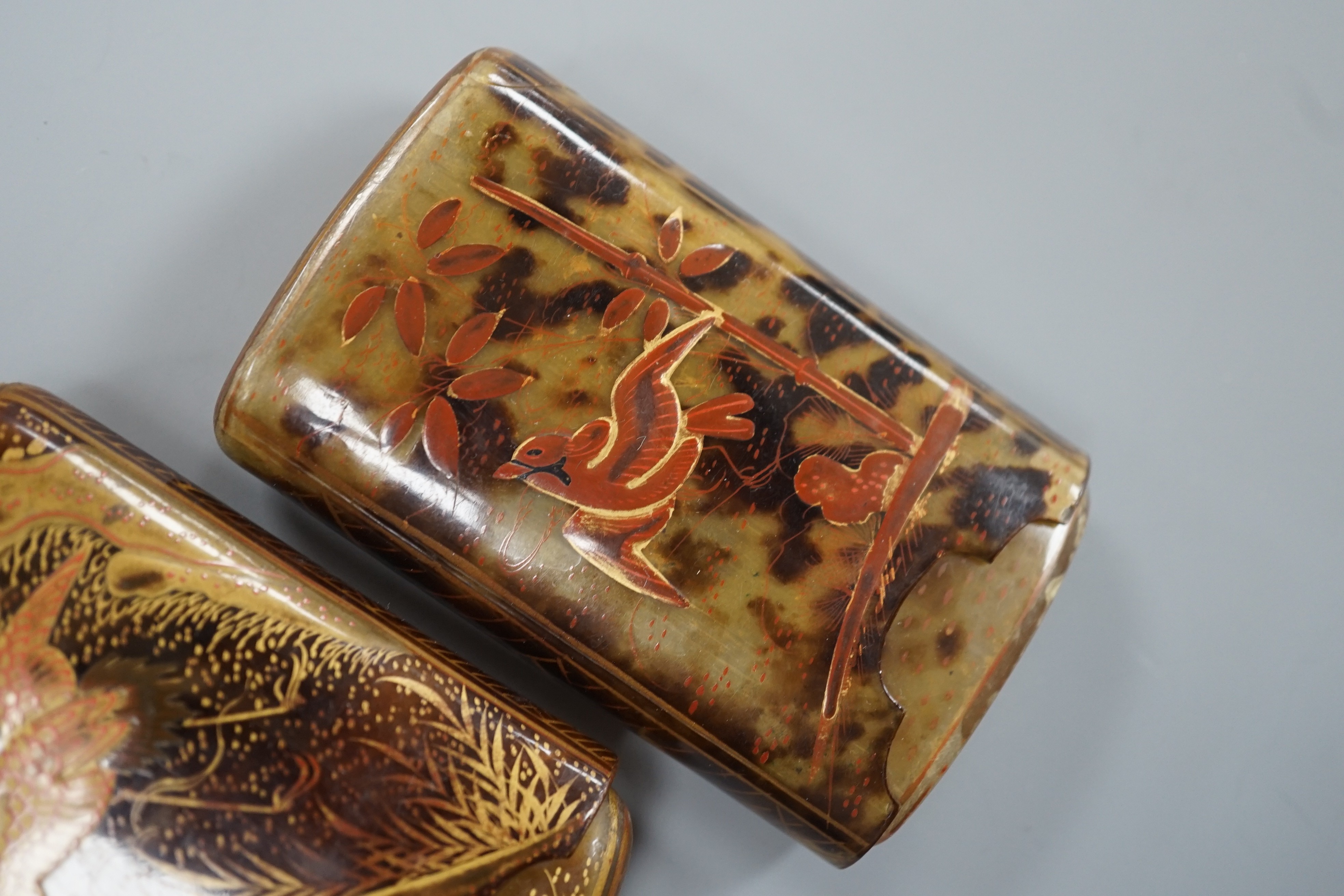 Two Japanese gilt lacquered tortoiseshell cigarette cases, 8 cm
